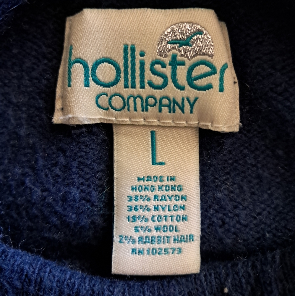 Hollister sweater with neck tie. Vintage. Size large...but I think runs small.
